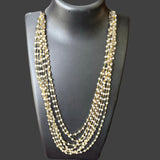 Pearl (round)gold plated 7 layered Mala