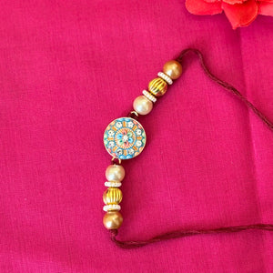 rakhi-blue and pink with stone -round