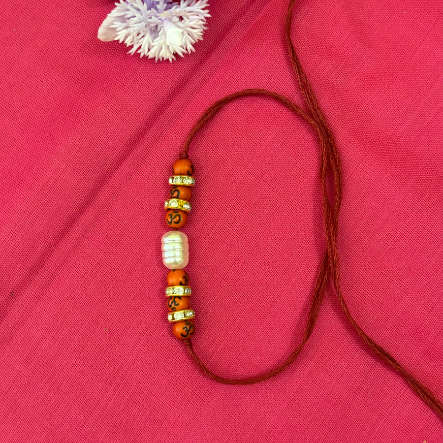 Rakhi- ohm printed beads and white bead(set of 3)