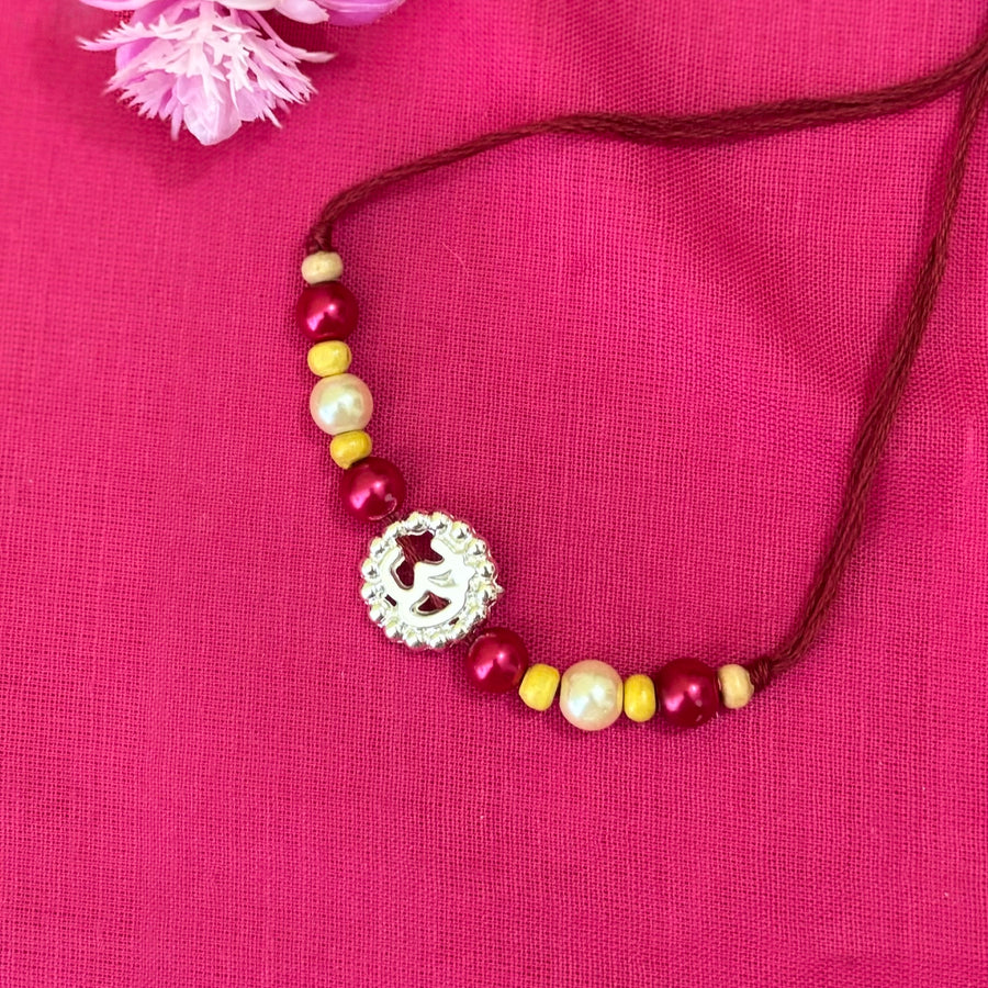 Rakhi- ohm silver pendent and beads(set of 3)