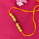 Rakhi- Rudraksha (replica) and pearl(set of 3)