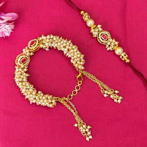 Rakhi- red/white ad stone Couple