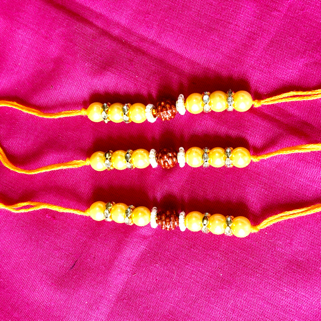 Rakhi- Rudraksha (replica) and pearl(set of 3)