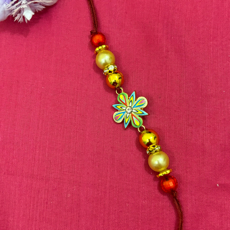 rakhi-blue flower with white stone -centered