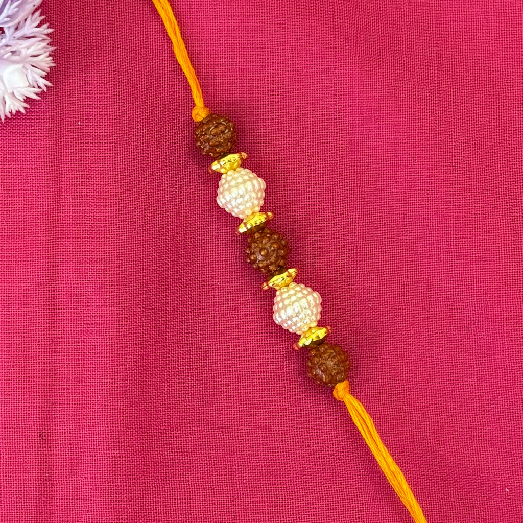 Rakhi- Rudraksha (replica) and white ball(set of 3)