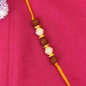Rakhi- Rudraksha (replica) and white ball(set of 3)