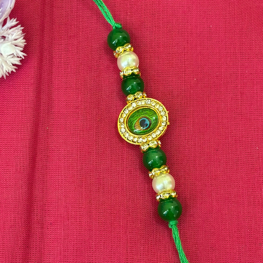 Peacock Feather Kundan Rakhi – oval