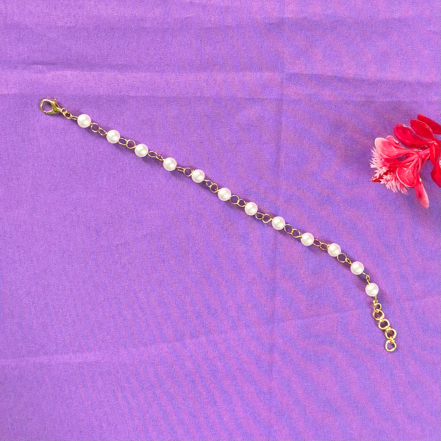 Golden wire knotted pearl bracelet
