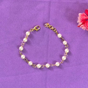 Golden wire knotted pearl bracelet