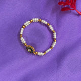Pearl and golden beaded bracelet