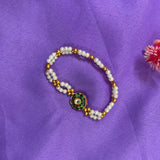 Pearl and golden beaded bracelet