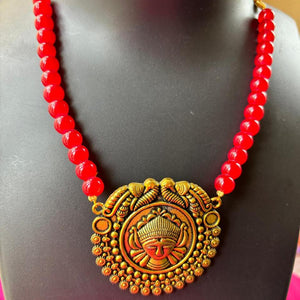 Red Glass bead necklace with  golden aloy pendent