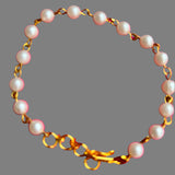 Golden pearl bracelet