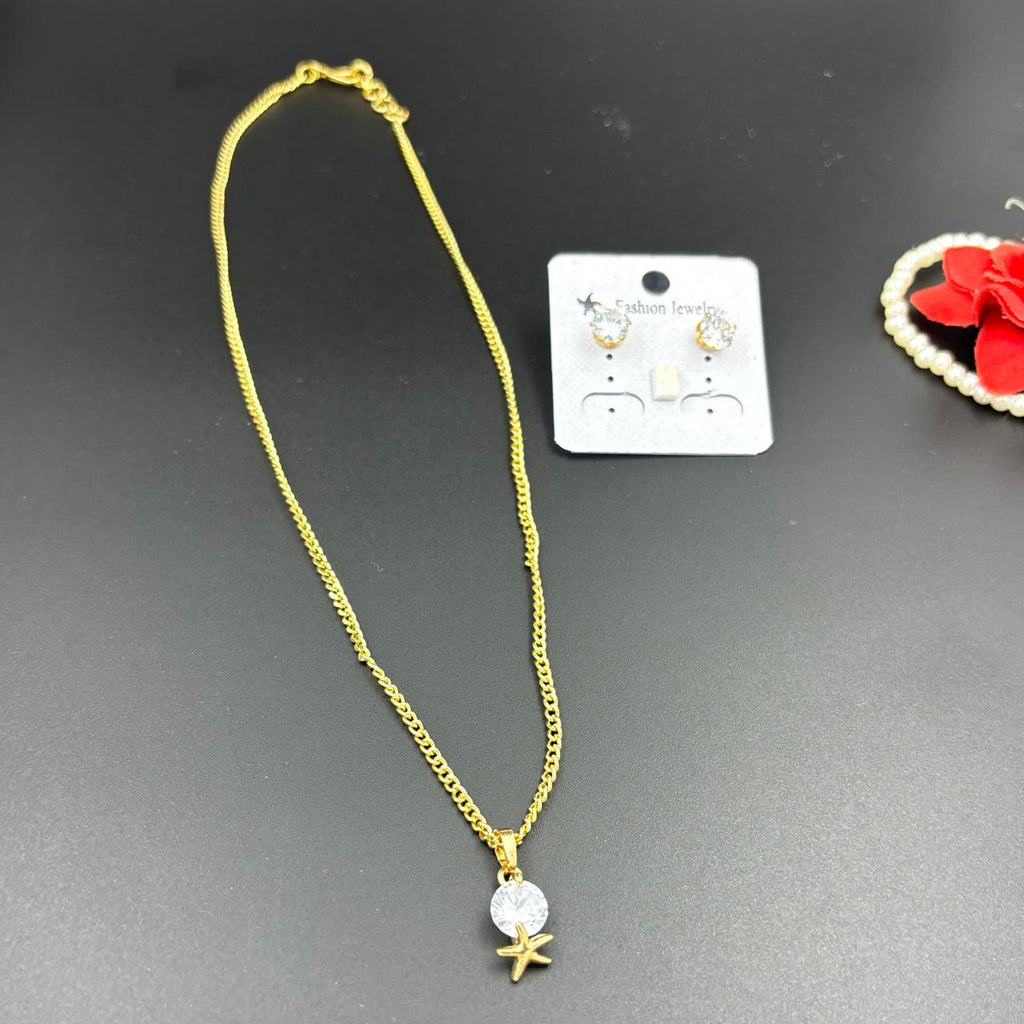 Golden chain with white stone pendent