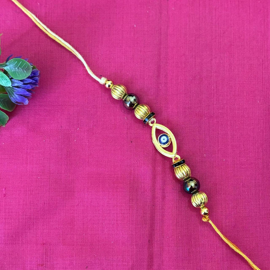 Rakhi- Evil Eye golden