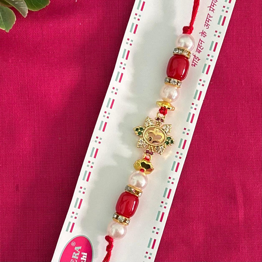 Rakhi ad stone - Golden Om