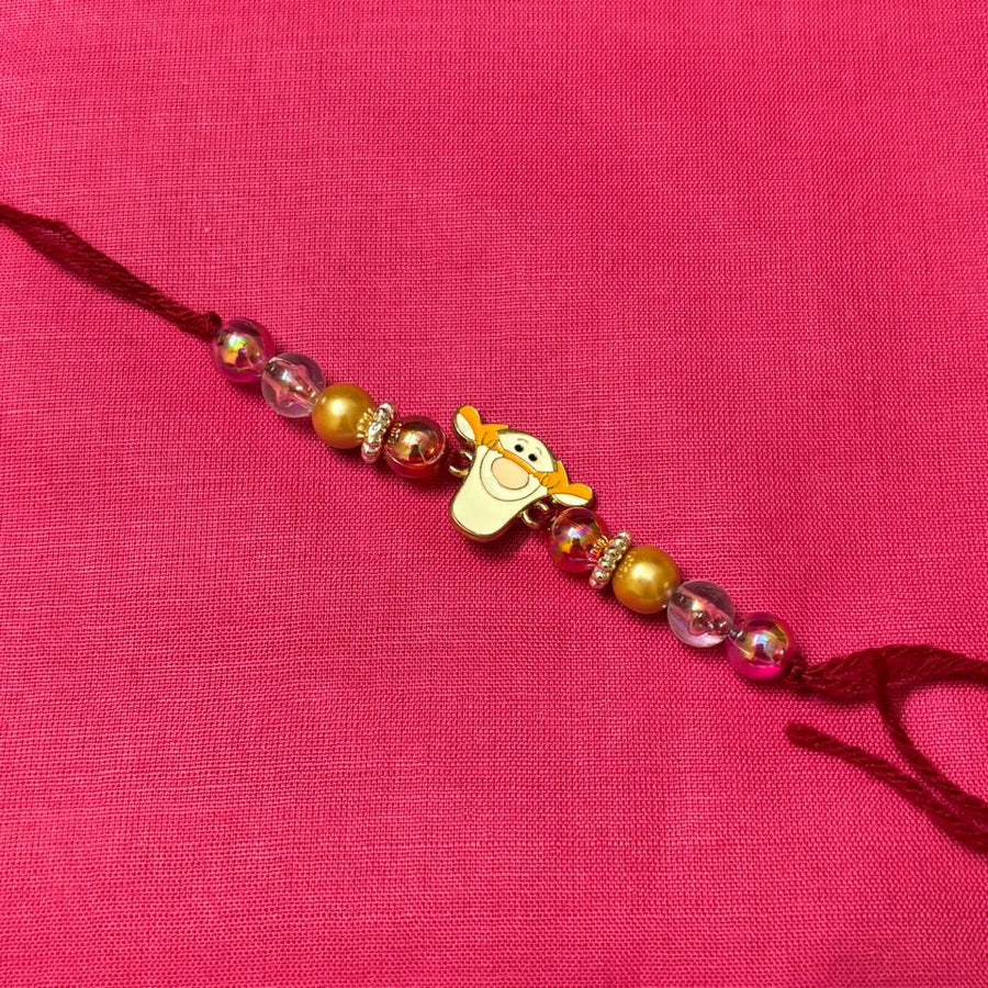 Rakhi for kids with tiger charm